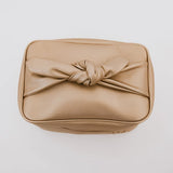 Emery Bow Makeup Bag in Gold